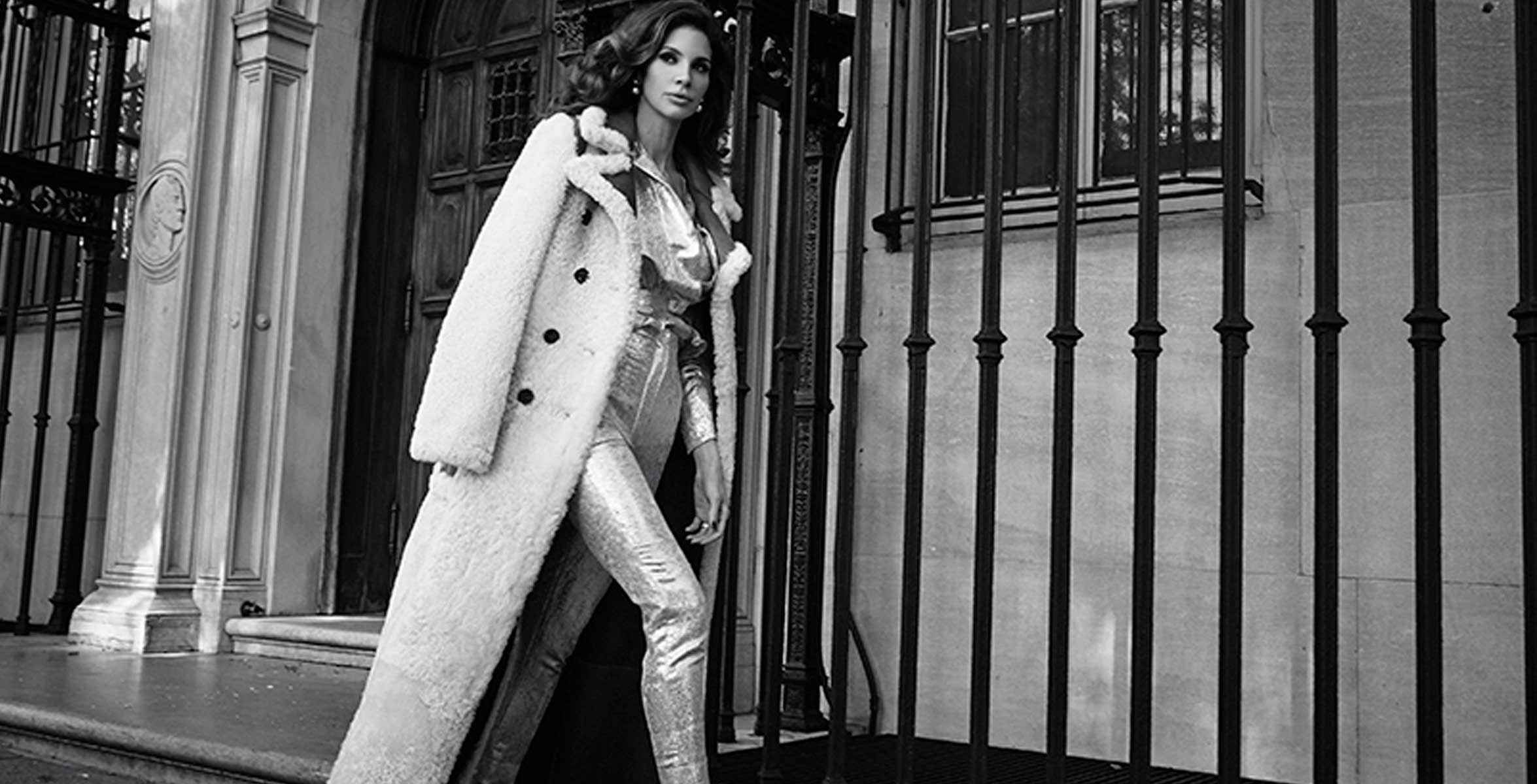 Hope Dworaczyk Smith models white coat from luxury designer Chloé.