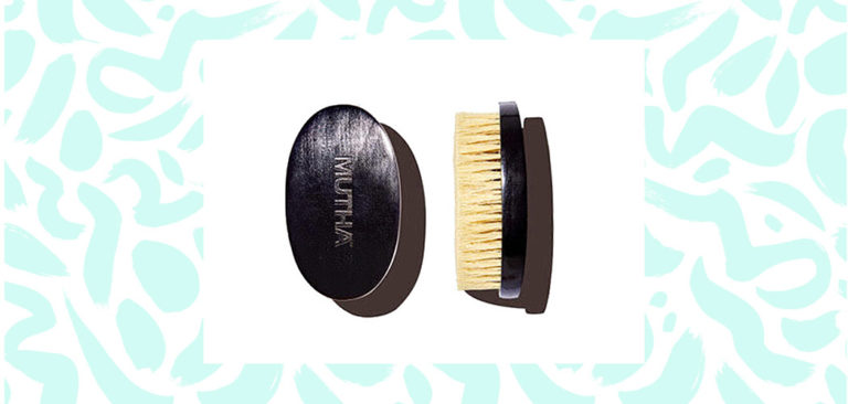 The MUTHA Body Brush is displayed from both an overhead and side vie