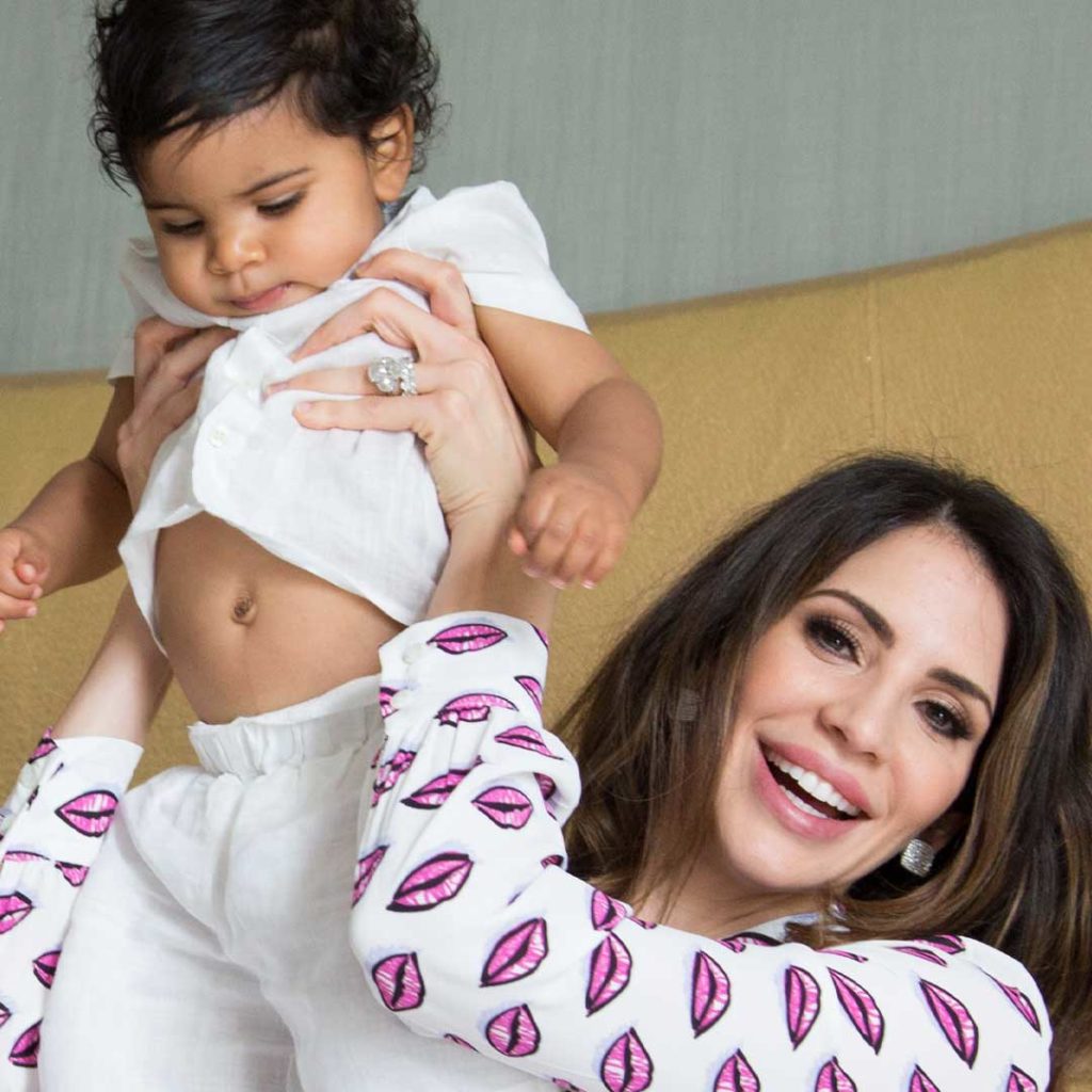Mother of four, Hope Dworaczyk Smith, enjoys playful moment with son.