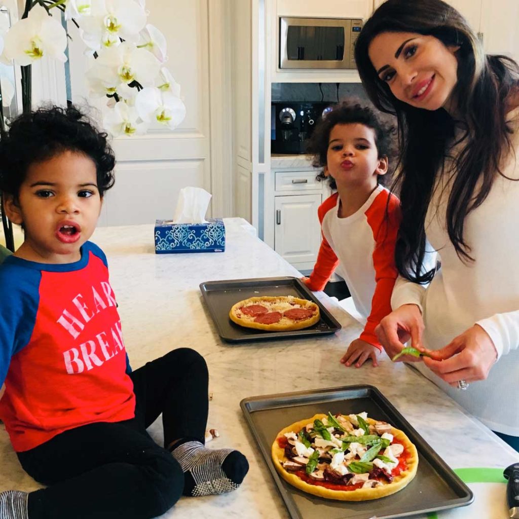 Hope Dworaczyk Smith and sons enjoy family activity in their kitchen.