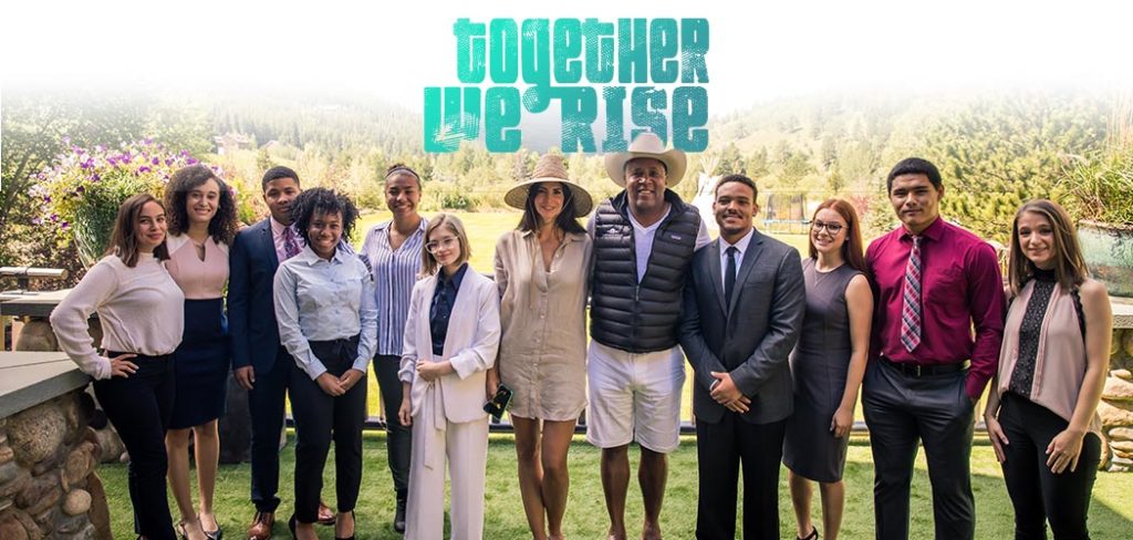 Together We Rise Family Fellows With Hope Hope Dworaczyk Smith and Robert F. Smith posing for a picture outside