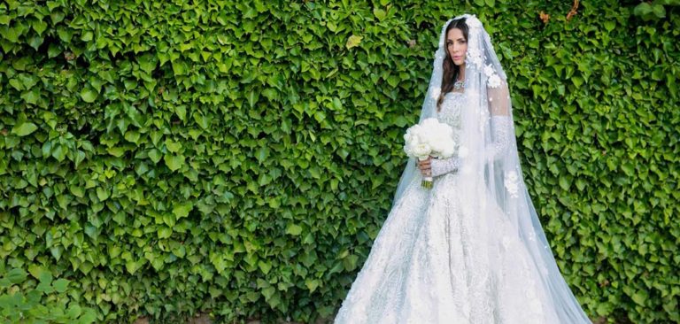 Hope Dworaczyk Smith stands in her wedding gown before marrying Robert F. Smith.