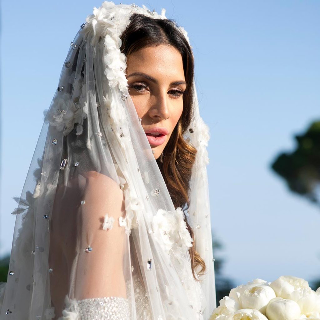 Side profile of Hope Dworaczyk in her wedding dress on her wedding day