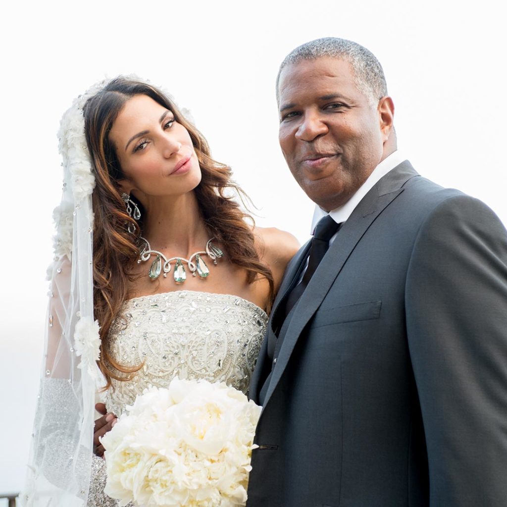 Hope Dworaczyk poses with her husband, Robert F. Smith, at their wedding